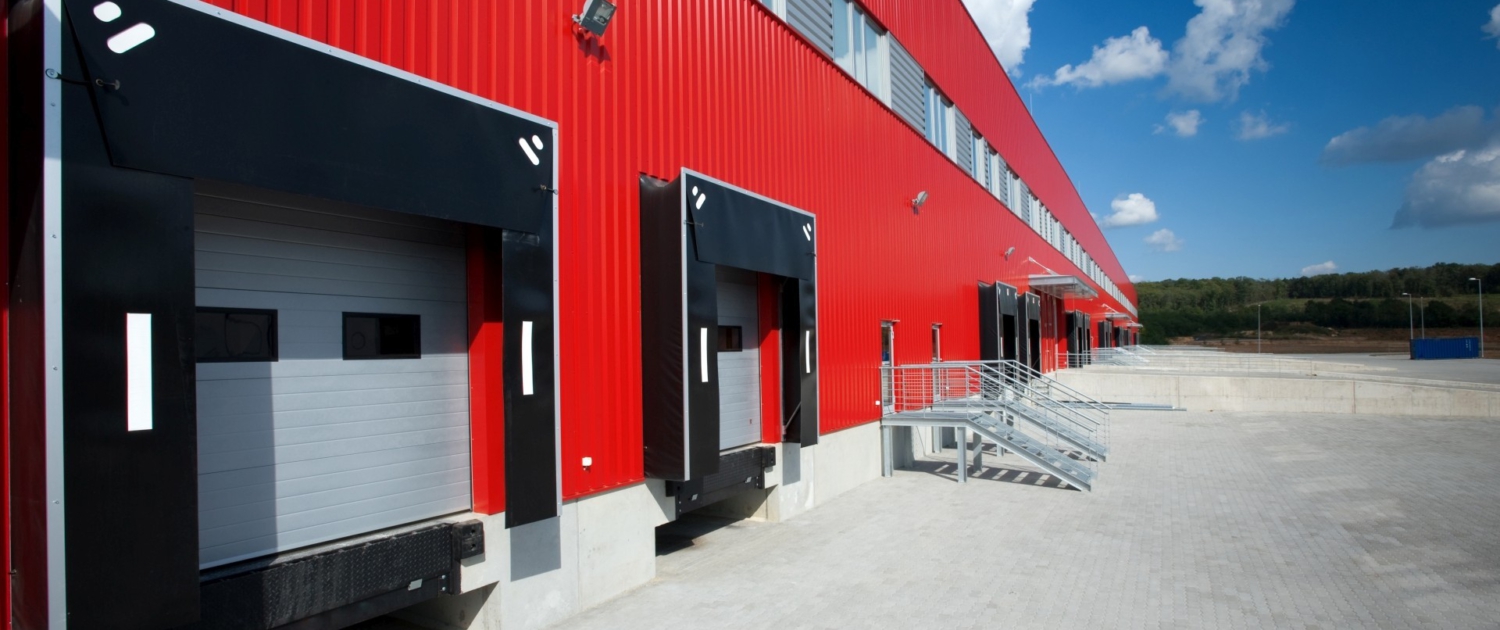 Red metal facade on modern warehousing unit Sale-and-Lease-back